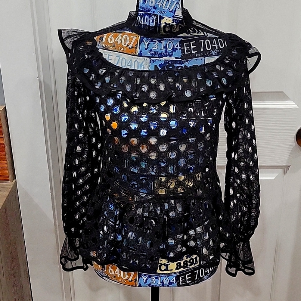 Black cutout long-sleeved blouse. Size S.